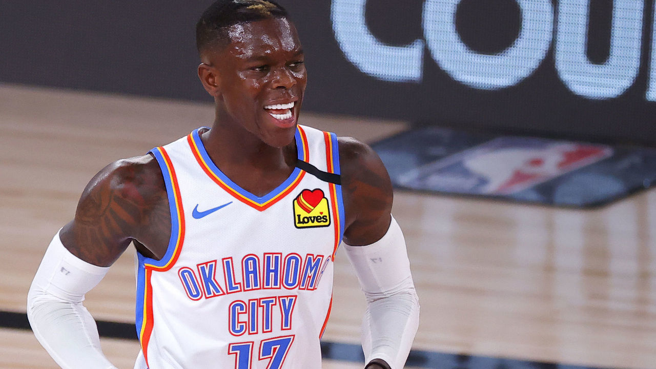 LAKE BUENA VISTA, FLORIDA - AUGUST 24: Dennis Schroder #17 of the Oklahoma City Thunder reacts after a teammate scores against the Houston Rockets during the second quarter in Game Four of the Western Conference First Round during the 2020 NBA Playoffs at AdventHealth Arena at ESPN Wide World Of Sports Complex on August 24, 2020 in Lake Buena Vista, Florida.