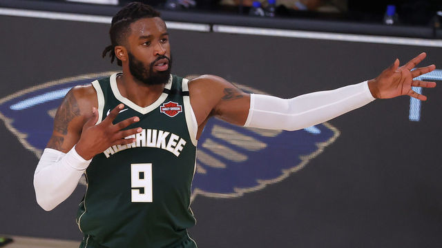 LAKE BUENA VISTA, FLORIDA - AUGUST 08: Wesley Matthews #9 of the Milwaukee Bucks reacts after hitting a three point basket against the Dallas Mavericks during the fourth quarter at The Arena at ESPN Wide World Of Sports Complex on August 08, 2020 in Lake Buena Vista, Florida.