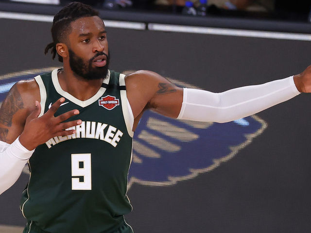 LAKE BUENA VISTA, FLORIDA - AUGUST 08: Wesley Matthews #9 of the Milwaukee Bucks reacts after hitting a three point basket against the Dallas Mavericks during the fourth quarter at The Arena at ESPN Wide World Of Sports Complex on August 08, 2020 in Lake Buena Vista, Florida.
