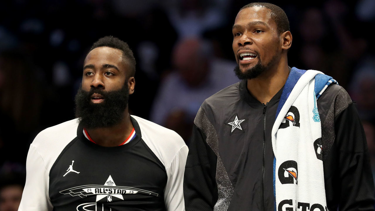 CHARLOTTE, NORTH CAROLINA - FEBRUARY 17: James Harden #13 of the Houston Rockets and teammate Kevin Durant #35 of the Golden State Warriors and Team LeBron watch on from the bench during the NBA All-Star game as part of the 2019 NBA All-Star Weekend at Spectrum Center on February 17, 2019 in Charlotte, North Carolina. NOTE TO USER: User expressly acknowledges and agrees that, by downloading and/or using this photograph, user is consenting to the terms and conditions of the Getty Images License Agreement.