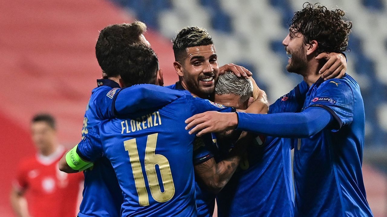 Italy's defender Emerson (C) celebrates with teammates after Italy's forward Domenico Berardi (L) scored Italy's second goal during the UEFA Nations League A, Group 1 football match Italy vs Poland on November 15, 2020 at the Mapei stadium in Reggio Emilia.