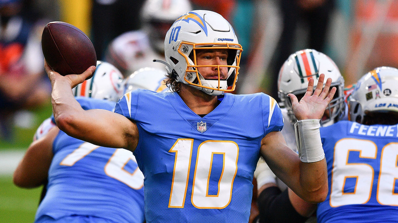 MIAMI GARDENS, FLORIDA - NOVEMBER 15: Justin Herbert #10 of the Los Angeles Chargers attempts a pass against the Miami Dolphins during the first half at Hard Rock Stadium on November 15, 2020 in Miami Gardens, Florida.