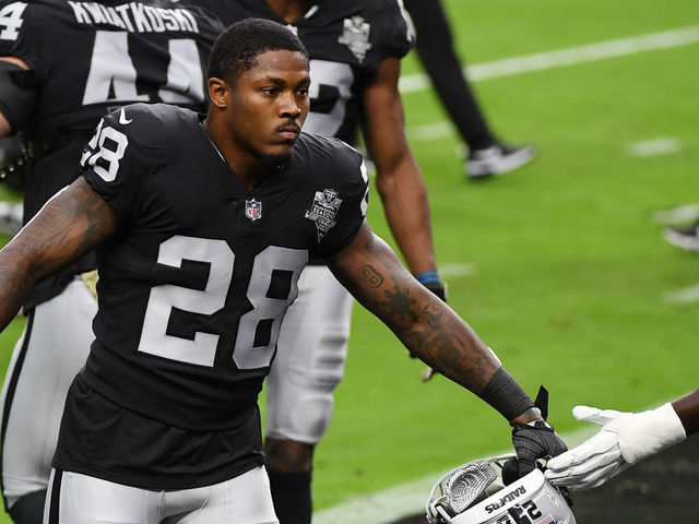 LAS VEGAS, NEVADA - NOVEMBER 15: Josh Jacobs #28 of the Las Vegas Raiders warms up against the Denver Broncos at Allegiant Stadium on November 15, 2020 in Las Vegas, Nevada.
