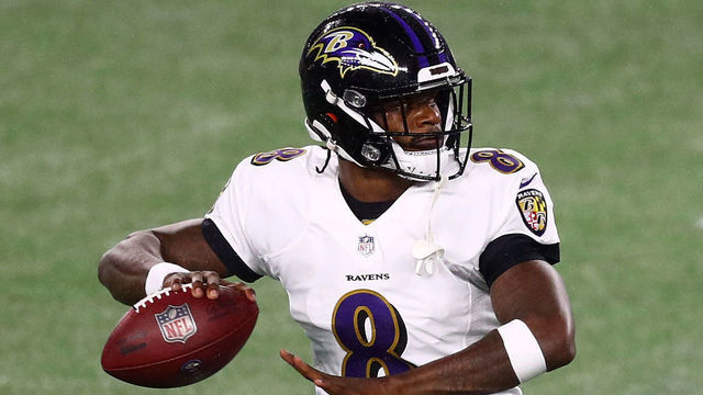 FOXBOROUGH, MASSACHUSETTS - NOVEMBER 15: Lamar Jackson #8 of the Baltimore Ravens warms up against the New England Patriots at Gillette Stadium on November 15, 2020 in Foxborough, Massachusetts.