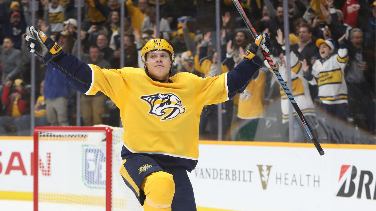 NASHVILLE, TN - FEBRUARY 27: Nashville Predators right wing Mikael Granlund (64) celebrates his overtime game-winning goal at the conclusion of the NHL game between the Nashville Predators and Calgary Flames, held on February 27, 2020, at Bridgestone Arena in Nashville, Tennessee.