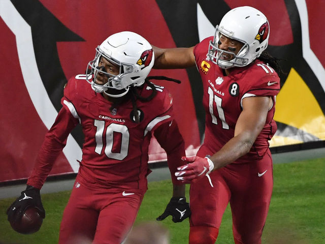 GLENDALE, ARIZONA - NOVEMBER 15: Wide receiver DeAndre Hopkins #10 of the Arizona Cardinals celebrates with wide receiver Larry Fitzgerald #11 after Hopkins caught the game-winning touchdown pass during the second half against the Buffalo Bills at State Farm Stadium on November 15, 2020 in Glendale, Arizona.