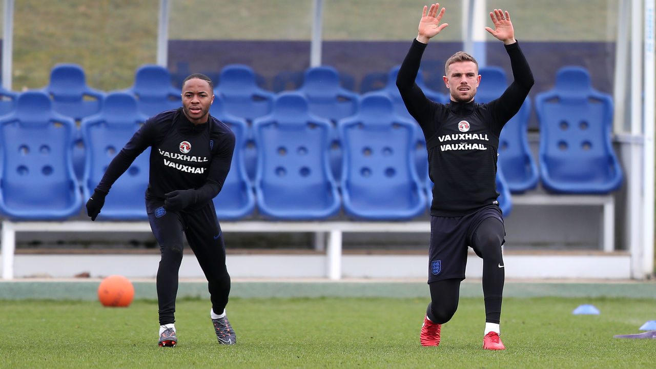 England's Raheem Sterling and Jordan Henderson during a training session at St Georges' Park, Burton.