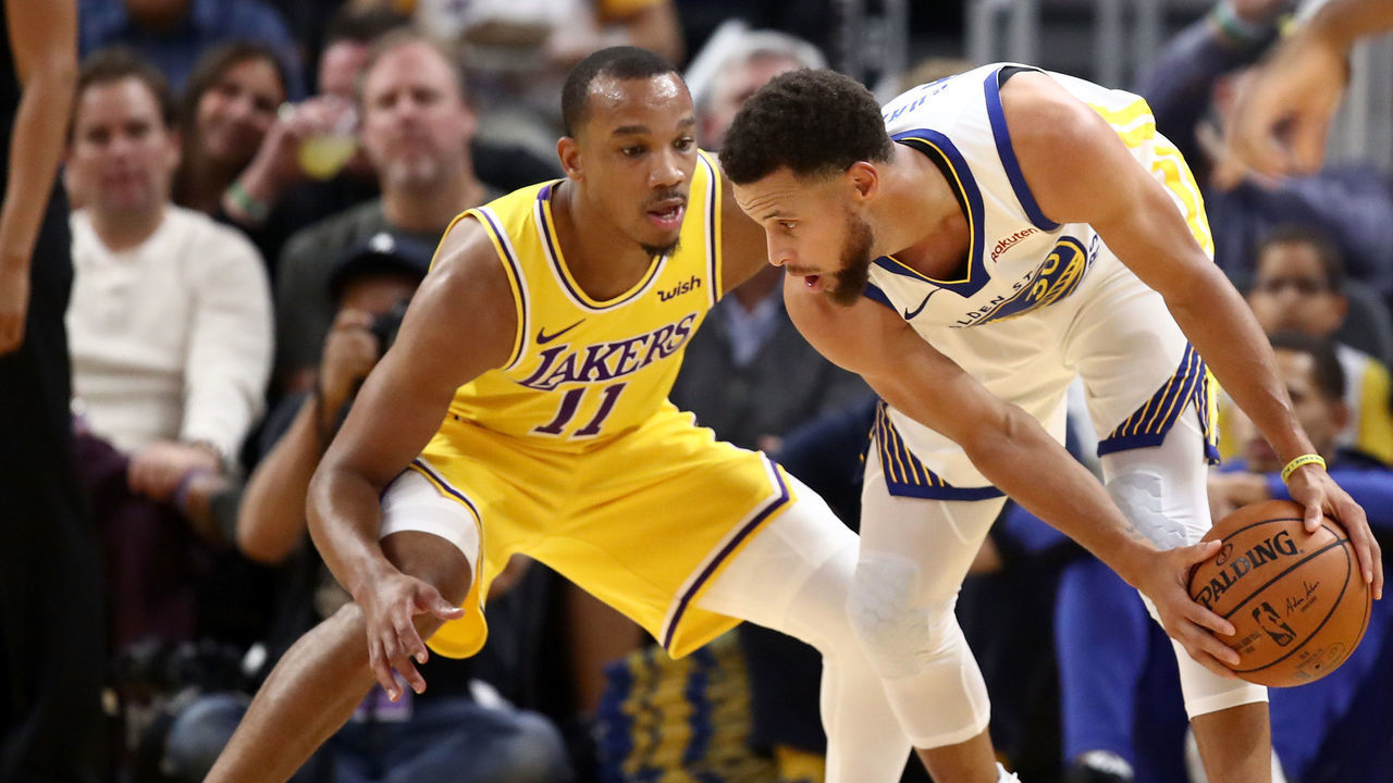 SAN FRANCISCO, CALIFORNIA - OCTOBER 05: Stephen Curry #30 of the Golden State Warriors is guarded by Avery Bradley #11 of the Los Angeles Lakers at Chase Center on October 05, 2019 in San Francisco, California.