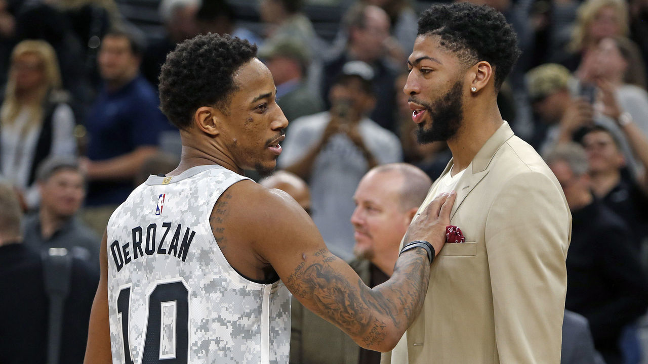 SAN ANTONIO, TX - FEBRUARY 2: DeMar DeRozan #10 of the San Antonio Spurs greets Anthony Davis #23 of the New Orleans Pelicans in street clothes at the end of the game at AT&T Center on February 2, 2019 in San Antonio, Texas. NOTE TO USER: User expressly acknowledges and agrees that , by downloading and or using this photograph, User is consenting to the terms and conditions of the Getty Images License Agreement.