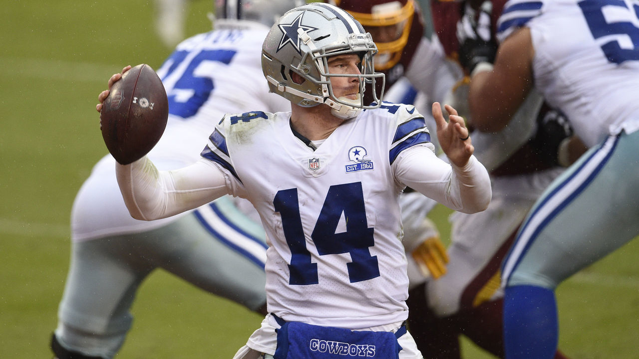 LANDOVER, MARYLAND - OCTOBER 25: Quarterback Andy Dalton #14 of the Dallas Cowboys looks to pass against the Washington Football Team in the third quarter of the game at FedExField on October 25, 2020 in Landover, Maryland.