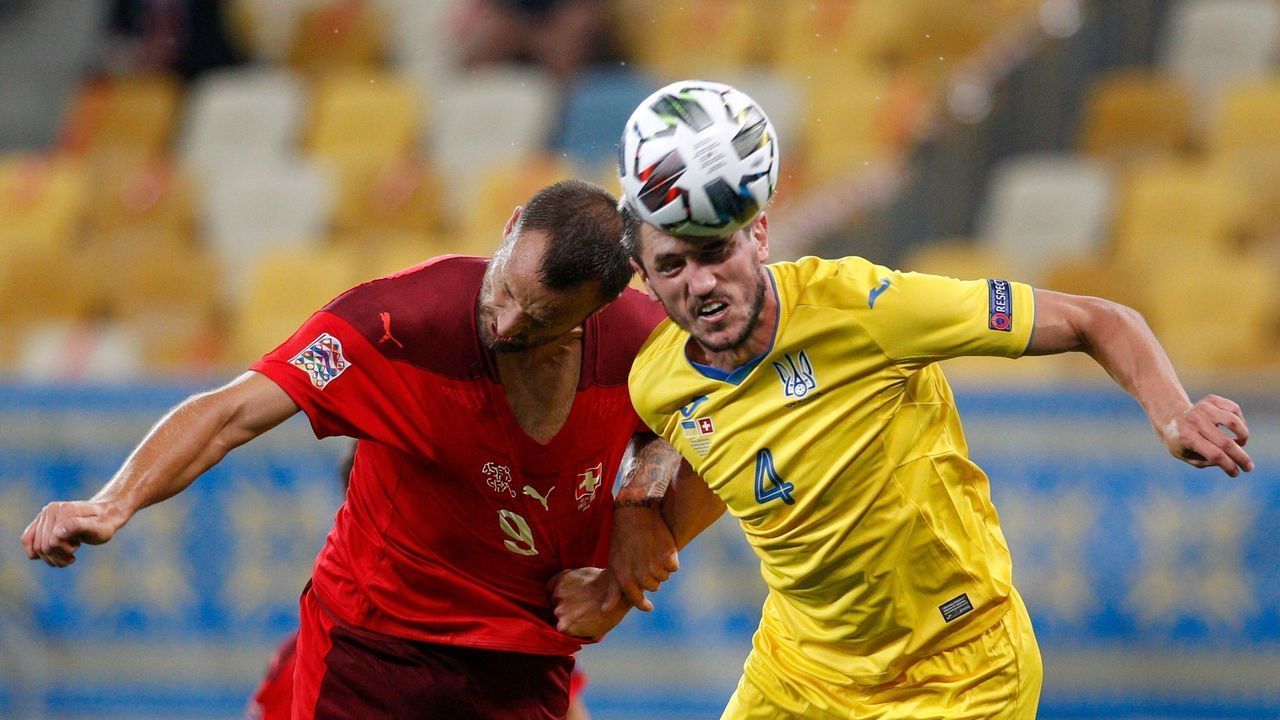 Switzerland's forward Haris Seferovic and Ukraine's defender Serhii Kryvtsov vie for the ball during the UEFA Nations League football match Ukraine against Switzerland at Lviv's Arena Lviv on September 3, 2020.