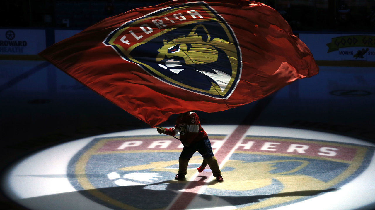SUNRISE, FLORIDA - OCTOBER 08: Florida Panthers mascot Stanley C. Panther waves a flag prior to the game between the Florida Panthers and the Carolina Hurricanes at BB&T Center on October 08, 2019 in Sunrise, Florida.