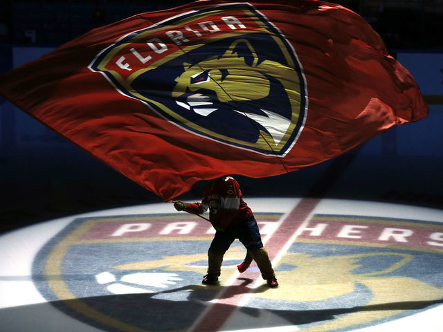SUNRISE, FLORIDA - OCTOBER 08: Florida Panthers mascot Stanley C. Panther waves a flag prior to the game between the Florida Panthers and the Carolina Hurricanes at BB&T Center on October 08, 2019 in Sunrise, Florida.