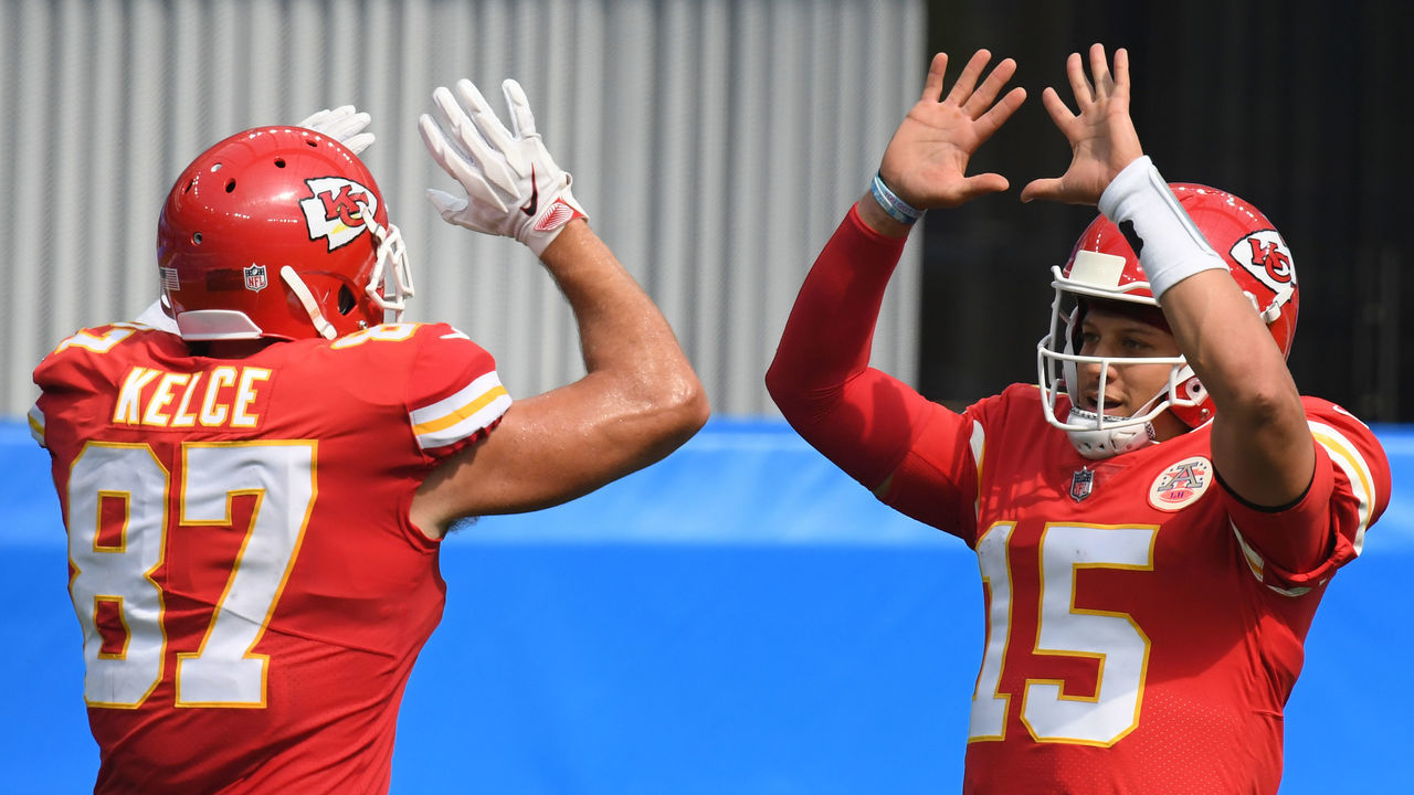 INGLEWOOD, CALIFORNIA - SEPTEMBER 20: Quarterback Patrick Mahomes #15 of the Kansas City Chiefs celebrates a touchdown by teammate tight end Travis Kelce #87 against the Los Angeles Chargers during the second quarter at SoFi Stadium on September 20, 2020 in Inglewood, California.