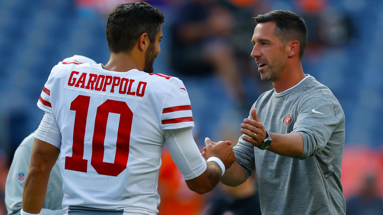 DENVER, CO - AUGUST 19: Quarterback Jimmy Garoppolo #10 and head coach Kyle Shanahan of the San Francisco 49ers shake hands before a preseason game against the Denver Broncos at Broncos Stadium at Mile High on August 19, 2019 in Denver, Colorado.