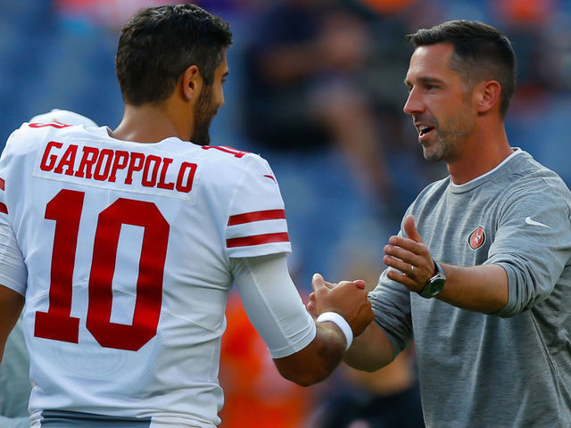 DENVER, CO - AUGUST 19: Quarterback Jimmy Garoppolo #10 and head coach Kyle Shanahan of the San Francisco 49ers shake hands before a preseason game against the Denver Broncos at Broncos Stadium at Mile High on August 19, 2019 in Denver, Colorado.