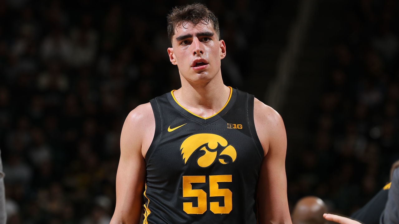 EAST LANSING, MI - FEBRUARY 25: Luka Garza #55 of the Iowa Hawkeyes walks to the bench in the second half of the game against the Michigan State Spartans at the Breslin Center on February 25, 2020 in East Lansing, Michigan.