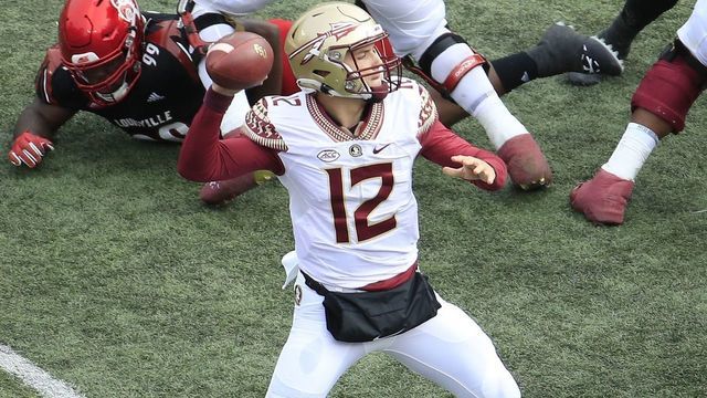LOUISVILLE, KENTUCKY - OCTOBER 24: Chubba Purdy #12 of the Florida State Seminoles passes the ball against the Louisville Cardinals at Cardinal Stadium on October 24, 2020 in Louisville, Kentucky.