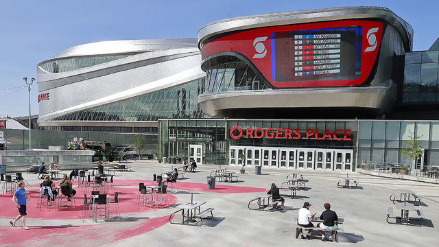 EDMONTON, ALBERTA - AUGUST 10: Players and staff watch the second phase of the NHL draft lottery as they sit in the recreation area outside Rogers Place on August 10, 2020 during the 2020 NHL Stanley Cup Playoffs in Edmonton, Alberta, Canada. The New York Rangers won the first pick.