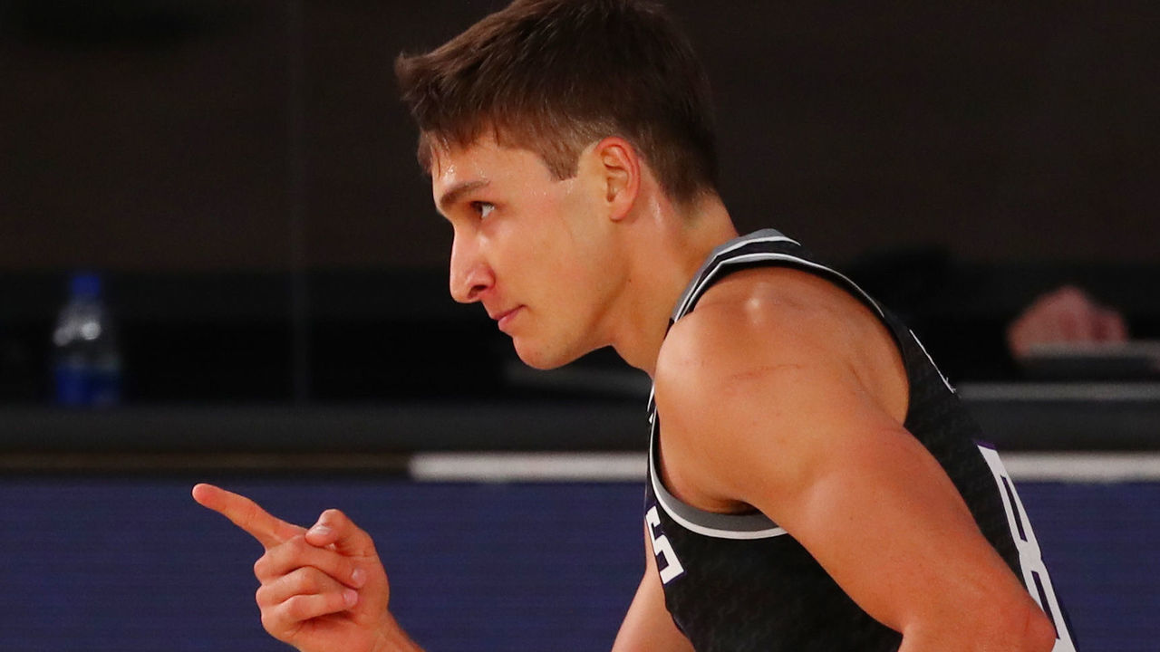 LAKE BUENA VISTA, FLORIDA - JULY 31: Bogdan Bogdanovic #8 of the Sacramento Kings celebrates after making a three point basket against the San Antonio Spurs in the first half of an NBA basketball game at the Visa Athletic Center in the ESPN Wide World Of Sports Complex on July 31, 2020 in Lake Buena Vista, Florida.