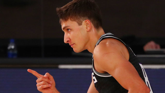 LAKE BUENA VISTA, FLORIDA - JULY 31: Bogdan Bogdanovic #8 of the Sacramento Kings celebrates after making a three point basket against the San Antonio Spurs in the first half of an NBA basketball game at the Visa Athletic Center in the ESPN Wide World Of Sports Complex on July 31, 2020 in Lake Buena Vista, Florida.