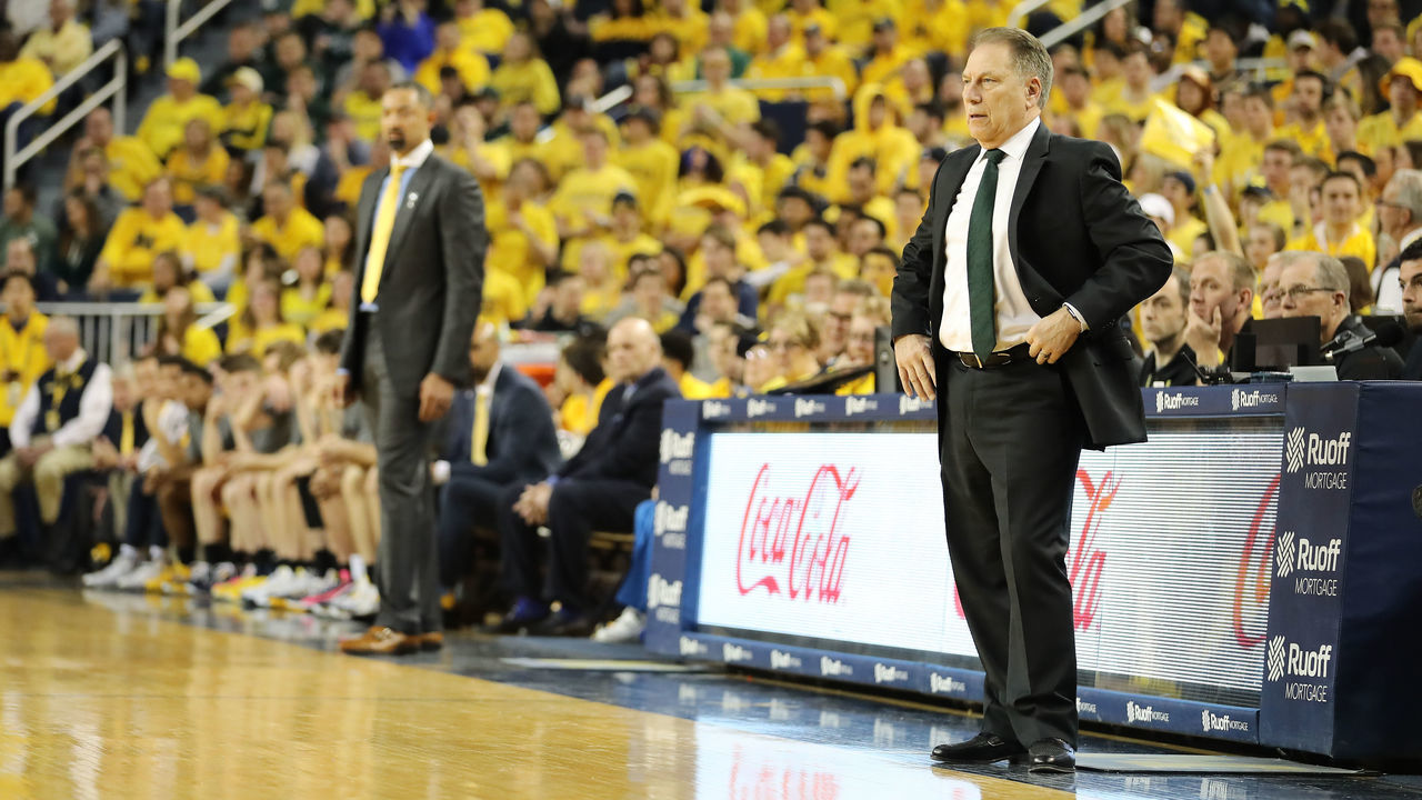 ANN ARBOR, MI - FEBRUARY 08: Head coach Tom Izzo of the Michigan State Spartans and head coach Juwan Howard of the Michigan Wolverines look on in the first half of the game at Crisler Arena on February 8, 2020 in Ann Arbor, Michigan.