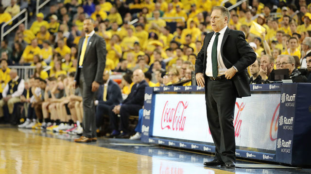 ANN ARBOR, MI - FEBRUARY 08: Head coach Tom Izzo of the Michigan State Spartans and head coach Juwan Howard of the Michigan Wolverines look on in the first half of the game at Crisler Arena on February 8, 2020 in Ann Arbor, Michigan.