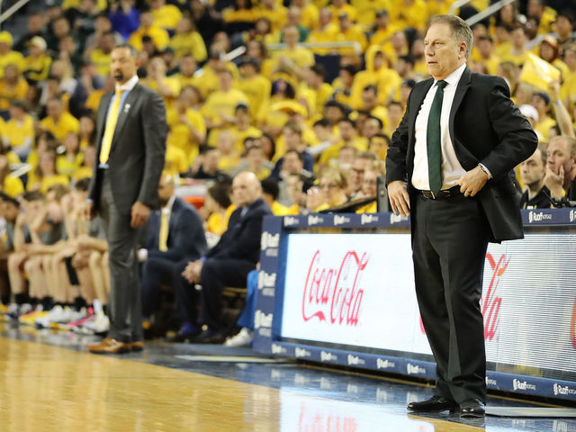 ANN ARBOR, MI - FEBRUARY 08: Head coach Tom Izzo of the Michigan State Spartans and head coach Juwan Howard of the Michigan Wolverines look on in the first half of the game at Crisler Arena on February 8, 2020 in Ann Arbor, Michigan.