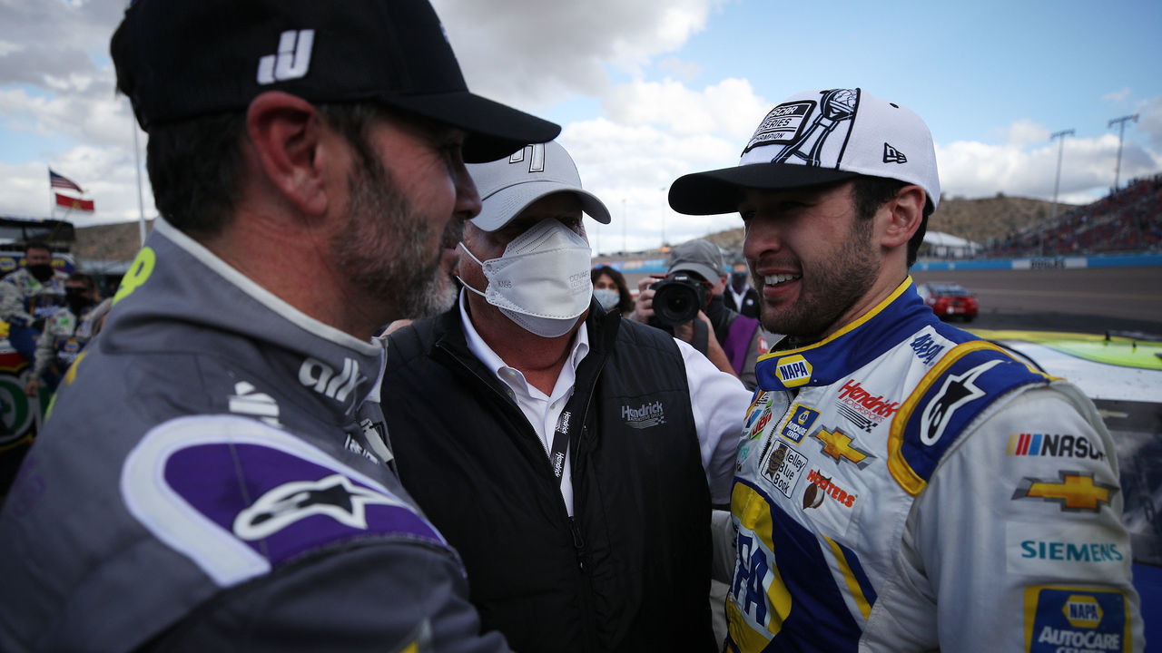 AVONDALE, ARIZONA - NOVEMBER 08: Chase Elliott, driver of the #9 NAPA Auto Parts Chevrolet, is congratulated by Jimmie Johnson, driver of the #48 Ally Chevrolet, and team owner and NASCAR Hall of Famer Rick Hendrick after winning the NASCAR Cup Series Season Finale 500 and the 2020 NASCAR Cup Series Championship at Phoenix Raceway on November 08, 2020 in Avondale, Arizona.
