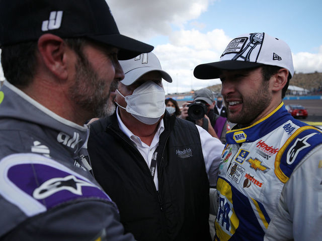 AVONDALE, ARIZONA - NOVEMBER 08: Chase Elliott, driver of the #9 NAPA Auto Parts Chevrolet, is congratulated by Jimmie Johnson, driver of the #48 Ally Chevrolet, and team owner and NASCAR Hall of Famer Rick Hendrick after winning the NASCAR Cup Series Season Finale 500 and the 2020 NASCAR Cup Series Championship at Phoenix Raceway on November 08, 2020 in Avondale, Arizona.