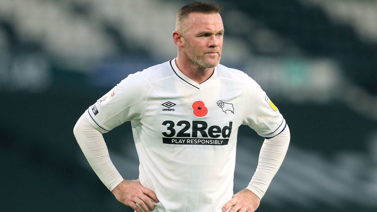 DERBY, ENGLAND - NOVEMBER 07: Wayne Rooney of Derby looks dejected during the Sky Bet Championship match between Derby County and Barnsley at Pride Park Stadium on November 7, 2020 in Derby, England. Sporting stadiums around the UK remain under strict restrictions due to the Coronavirus Pandemic as Government social distancing laws prohibit fans inside venues resulting in games being played behind closed doors.