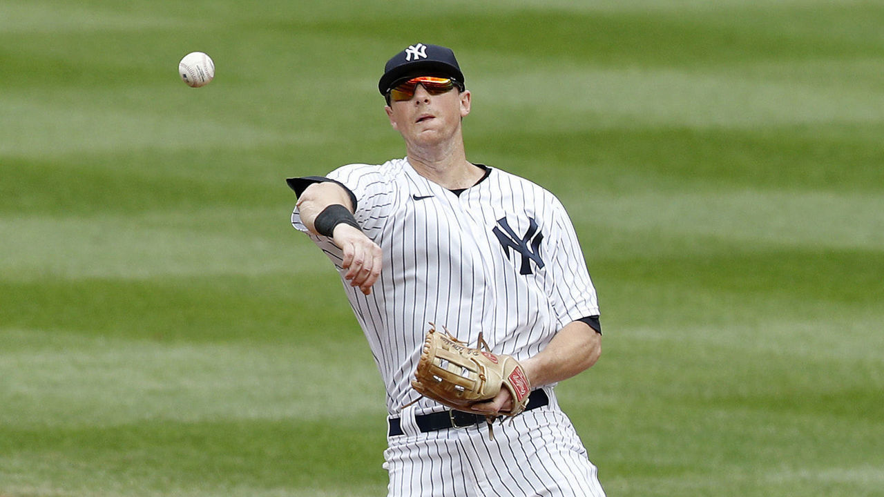 NEW YORK, NEW YORK - SEPTEMBER 26: (NEW YORK DAILIES OUT) DJ LeMahieu #26 of the New York Yankees in action against Jon Berti #5 of the Miami Marlins at Yankee Stadium on September 26, 2020 in New York City. The Yankees defeated the Marlins 11-4.