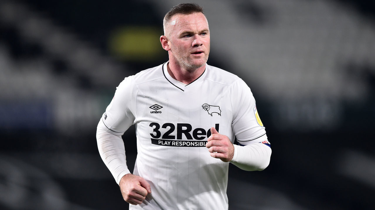 DERBY, ENGLAND - NOVEMBER 04: Wayne Rooney of Derby County in action during the Sky Bet Championship match between Derby County and Queens Park Rangers at Pride Park Stadium on November 04, 2020 in Derby, England. Sporting stadiums around the UK remain under strict restrictions due to the Coronavirus Pandemic as Government social distancing laws prohibit fans inside venues resulting in games being played behind closed doors.