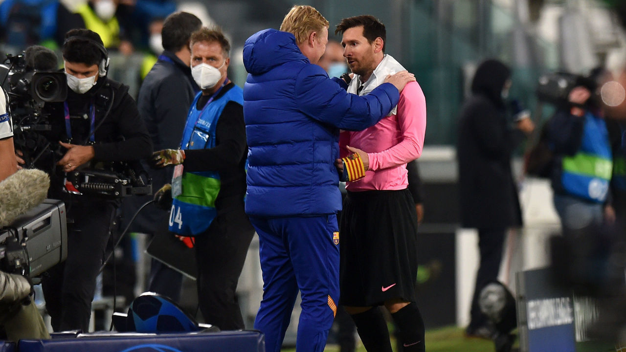 TURIN, ITALY - OCTOBER 28: Ronald Koeman, Head Coach of Barcelona and Lionel Messi of Barcelona speak during the UEFA Champions League Group G stage match between Juventus and FC Barcelona at Juventus Stadium on October 28, 2020 in Turin, Italy. Sporting stadiums around Italy remain under strict restrictions due to the Coronavirus Pandemic as Government social distancing laws prohibit fans inside venues resulting in games being played behind closed doors.