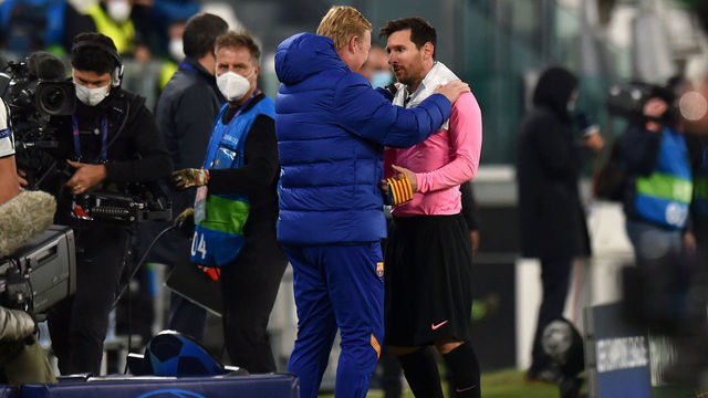 TURIN, ITALY - OCTOBER 28: Ronald Koeman, Head Coach of Barcelona and Lionel Messi of Barcelona speak during the UEFA Champions League Group G stage match between Juventus and FC Barcelona at Juventus Stadium on October 28, 2020 in Turin, Italy. Sporting stadiums around Italy remain under strict restrictions due to the Coronavirus Pandemic as Government social distancing laws prohibit fans inside venues resulting in games being played behind closed doors.