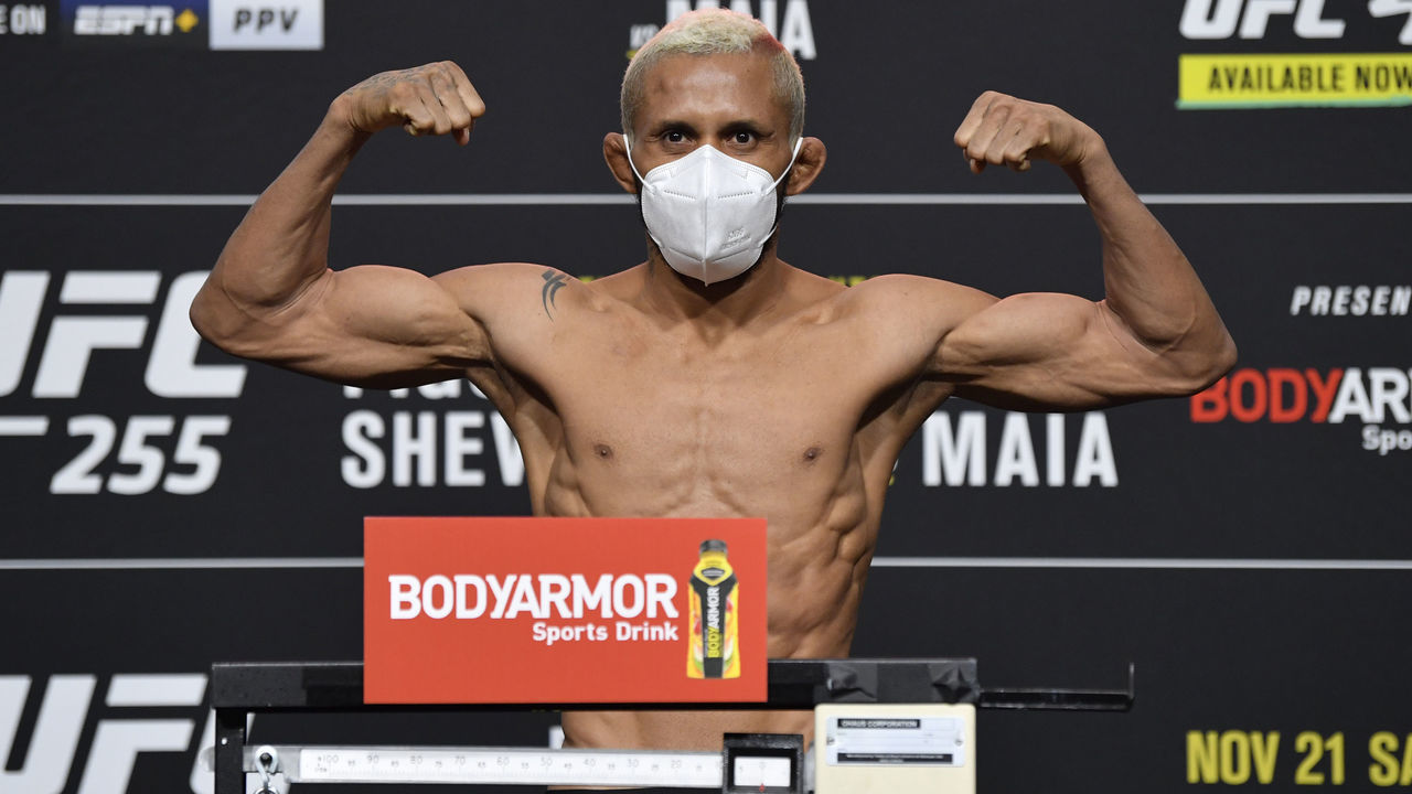 LAS VEGAS, NEVADA - NOVEMBER 20: Deiveson Figueiredo of Brazil poses on the scale during the UFC 255 weigh-in at UFC APEX on November 20, 2020 in Las Vegas, Nevada.