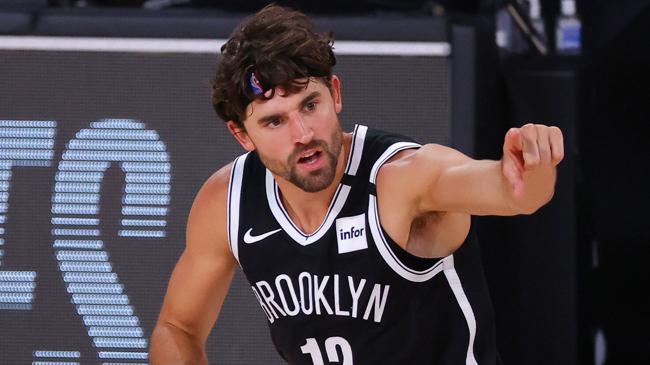 LAKE BUENA VISTA, FLORIDA - AUGUST 17: Joe Harris #12 of the Brooklyn Nets reacts after hitting a three point basket against the Toronto Raptors during the second quarter in Game One of the Eastern Conference First Round during the 2020 NBA Playoffs at AdventHealth Arena at ESPN Wide World Of Sports Complex on August 17, 2020 in Lake Buena Vista, Florida.