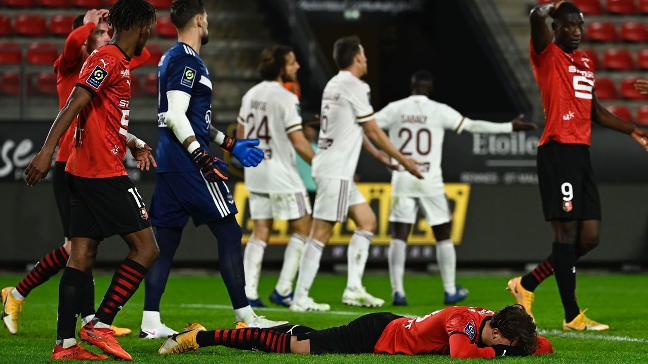 Rennes' French forward Adrien Hunou reacts on the ground after missing a goal during the French L1 football match between Stade Rennais and Bordeaux, at the Roazhon Park stadium in Rennes, northwestern France on November 20, 2020.