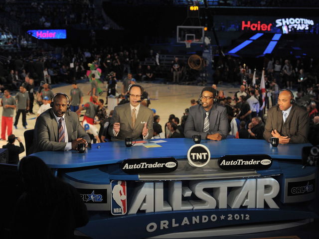 VIDEO: Ernie Johnson says 'I stack paper to the ceiling and ride on 24-inch chrome'