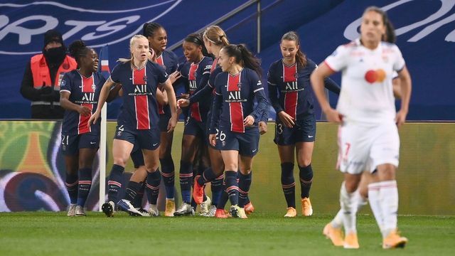 Paris Saint-Germain's French forward Marie Antoinette Katoto is congratuled after scoring a goal during the French Women's D1 football match between Paris Saint-Germain and Lyon at the Parc des Princes stadium in Paris on November 20, 2020.