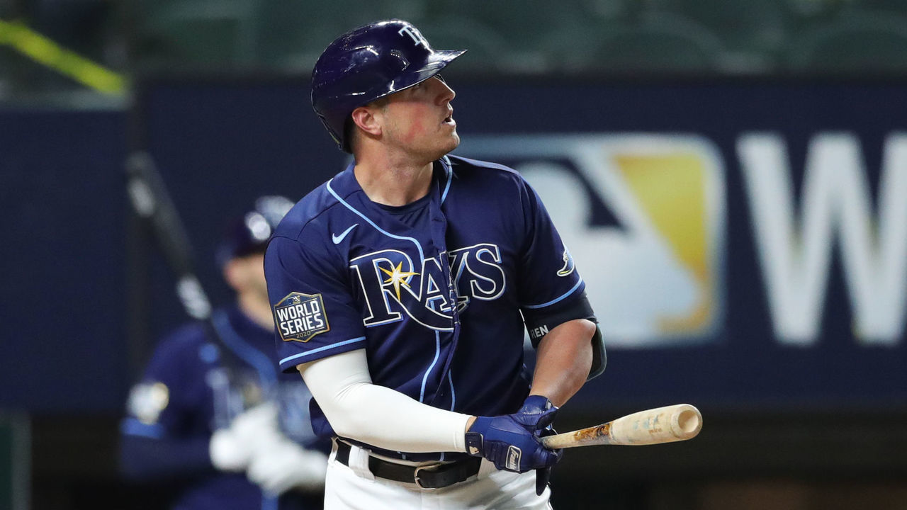 ARLINGTON, TX - OCTOBER 24: Hunter Renfroe #11 of the Tampa Bay Rays hits a solo home run in the fifth inning during Game 4 of the 2020 World Series between the Los Angeles Dodgers and the Tampa Bay Rays at Globe Life Field on Saturday, October 24, 2020 in Arlington, Texas.