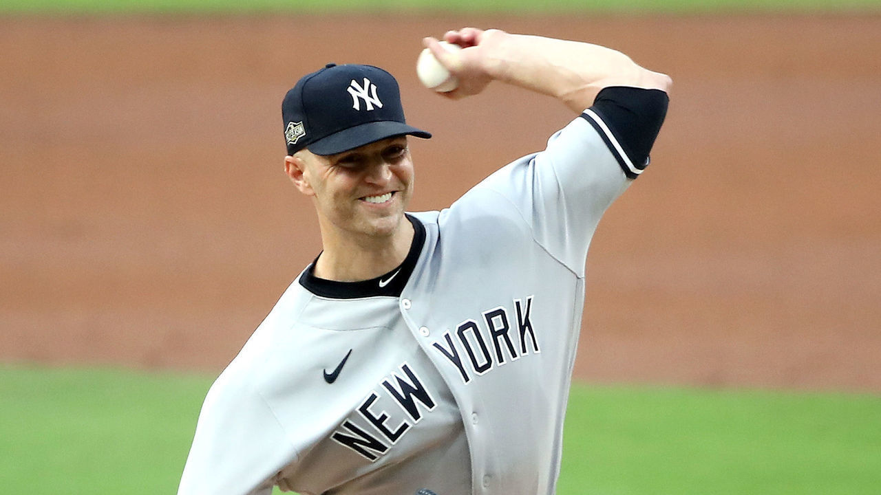 SAN DIEGO, CALIFORNIA - OCTOBER 06: J.A. Happ #33 of the New York Yankees delivers the pitch against the Tampa Bay Rays during the second inning in Game Two of the American League Division Series at PETCO Park on October 06, 2020 in San Diego, California.