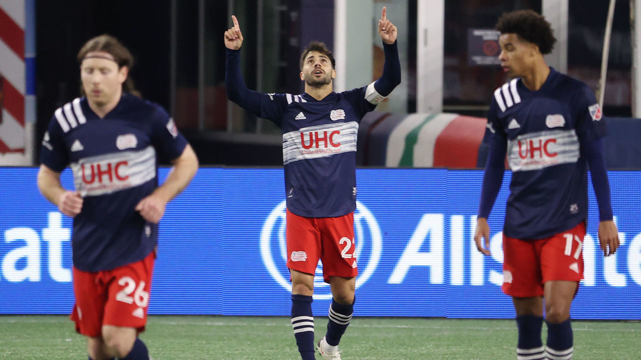 FOXBOROUGH, MASSACHUSETTS - NOVEMBER 20: Carles Gil #22 of New England Revolution celebrates after scoring a goal against the Montreal Impact during the Play-In Round match of the MLS Cup Playoffs at Gillette Stadium on November 20, 2020 in Foxborough, Massachusetts.