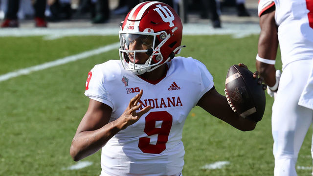 EAST LANSING, MI - NOVEMBER 14: Michael Penix Jr. #9 of the Indiana Hoosiers drops back to pass in the first quarter of the game against the Michigan State Spartans at Spartan Stadium on November 14, 2020 in East Lansing, Michigan.