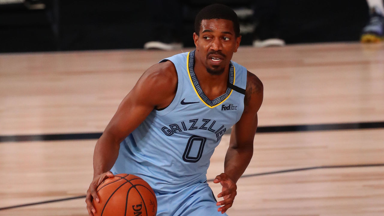 LAKE BUENA VISTA, FLORIDA - AUGUST 13: De'Anthony Melton #0 of the Memphis Grizzlies controls the ball against the Milwaukee Bucks in the first half during an NBA basketball game at Visa Athletic Center at ESPN Wide World Of Sports Complex on August 13, 2020 in Lake Buena Vista, Florida.