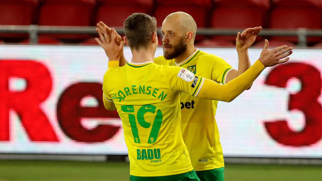 Norwich City's Jacob Lungi Sorensen congratulates Norwich City's Teemu Pukki after he scores from the spot during the Sky Bet Championship match at the Riverside Stadium, Middlesbrough.