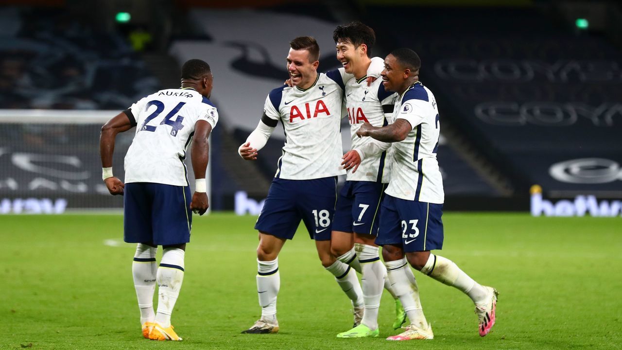 Tottenham Hotspur's Argentinian midfielder Giovani Lo Celso (2nd L) celebrates with teammates after scoring their second goal during the English Premier League football match between Tottenham Hotspur and Manchester City at Tottenham Hotspur Stadium in London, on November 21, 2020.