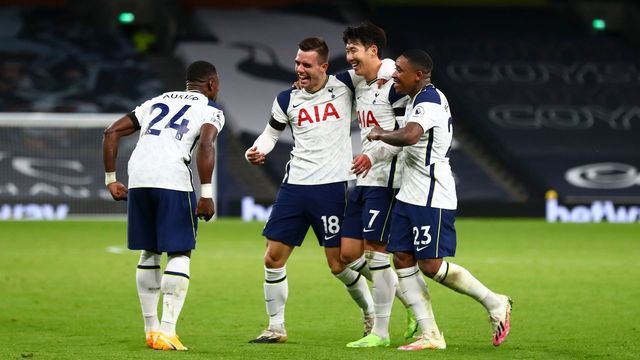 Tottenham Hotspur's Argentinian midfielder Giovani Lo Celso (2nd L) celebrates with teammates after scoring their second goal during the English Premier League football match between Tottenham Hotspur and Manchester City at Tottenham Hotspur Stadium in London, on November 21, 2020.