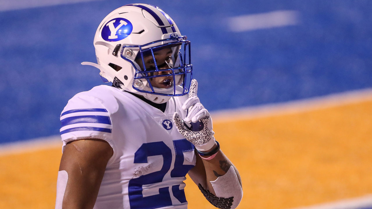 BOISE, ID - NOVEMBER 6: Running back Tyler Allgeier #25 of the BYU Cougars celebrates a touchdown during the first half against the Boise State Broncos at Albertsons Stadium on November 6, 2020 in Boise, Idaho.