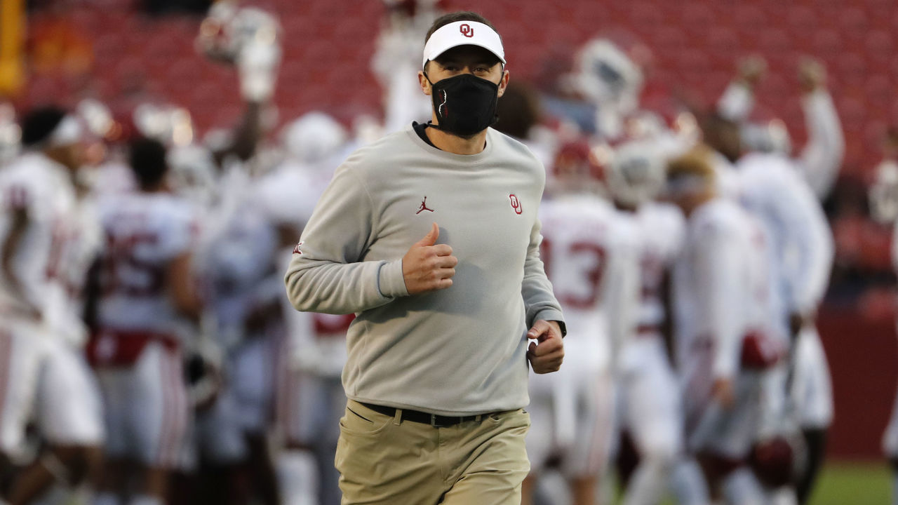AMES, IA - OCTOBER 3: Head coach Lincoln Riley of the Oklahoma Sooners runs off the field after pregame warm ups at Jack Trice Stadium on October 3, 2020 in Ames, Iowa. The Iowa State Cyclones won 37-30 over the Oklahoma Sooners.